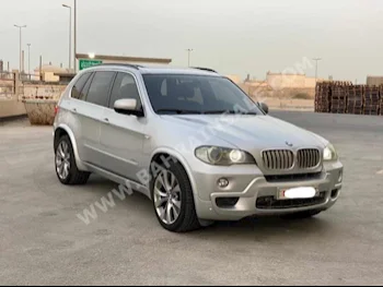 BMW  X-Series  5  2010  SUV  Automatic  8  196,650  AWD  Silver  Gasoline