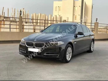 BMW  5-Series  520i  2014  Sedan  Automatic  4  79,700  FWD  Brown  Gasoline