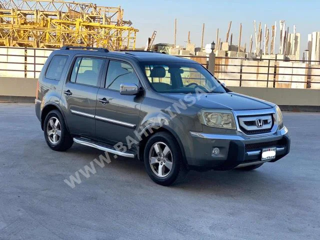 Honda  Pilot  2009  SUV  Automatic  6  145,300  4WD  Gray  Gasoline