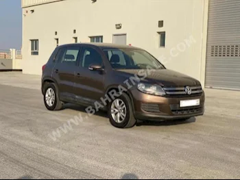 Volkswagen  TIGUAN  1.4 TSI  2015  SUV  Automatic  4  209,400  FWD  Brown  Gasoline