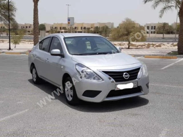 Nissan  Sunny  2017  Sedan  Automatic  4  125,150  FWD  Silver  Gasoline