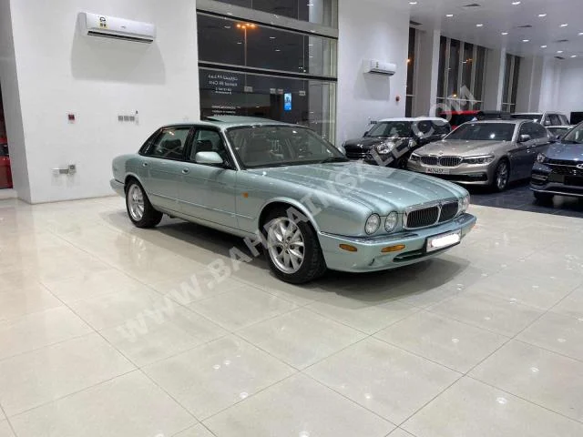 Jaguar  XJ  8  1998  Sedan  Automatic  8  19,800  RWD  Green  Gasoline