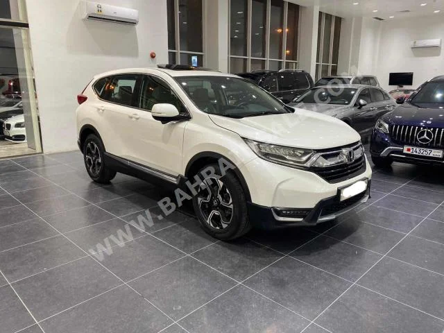 Honda  CRV  2018  SUV  Automatic  4  34,100  AWD  White  Gasoline