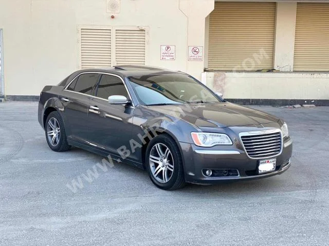 Chrysler  300C  2013  Sedan  Automatic  8  59,650  RWD  Gray  Gasoline
