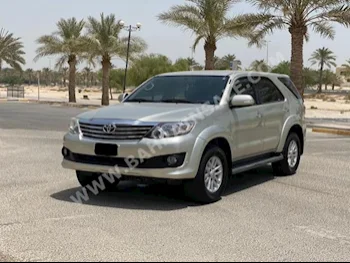 Toyota  Fortuner  2014  SUV  Automatic  4  100,200  RWD  Silver  Gasoline