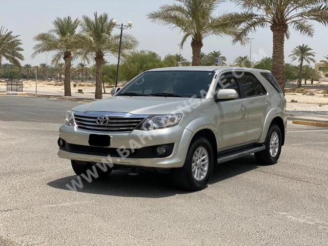 Toyota  Fortuner  2014  SUV  Automatic  4  100,200  RWD  Silver  Gasoline