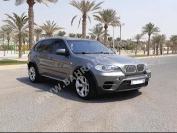 BMW  X-Series  5  2012  SUV  Automatic  8  128,850  RWD  Gray  Gasoline