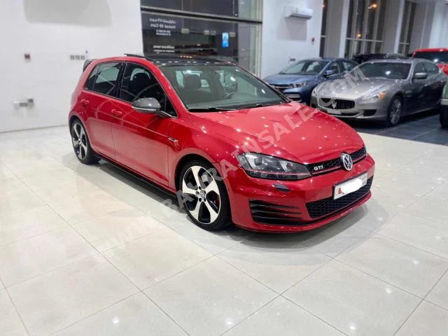 Volkswagen  Golf  GTI  2014  Hatchback  Automatic  4  124,500  FWD  Red  Gasoline