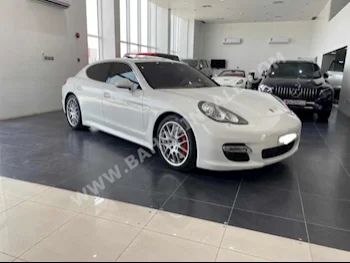 بورش  بانميرا  توربو  2010  كوبيه \ سبورت  اتوماتك  8  80,900  دفع خلفي  أبيض  بنزين