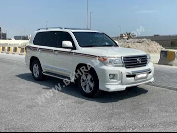 Toyota  Land Cruiser  GXR  2014  SUV  Automatic  8  215,050  AWD  Pearl  Gasoline