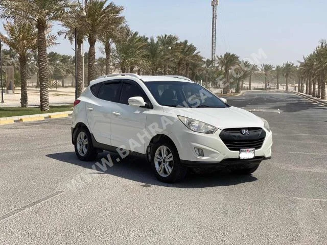 هيونداي تكسن 2012 اس يو في اتوماتك 4 194,150 دفع أمامي أبيض بنزين