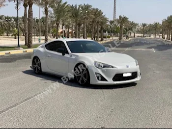 Toyota  86  2013  Coupe / Sport  Manual  4  138,900  FWD  White  Gasoline