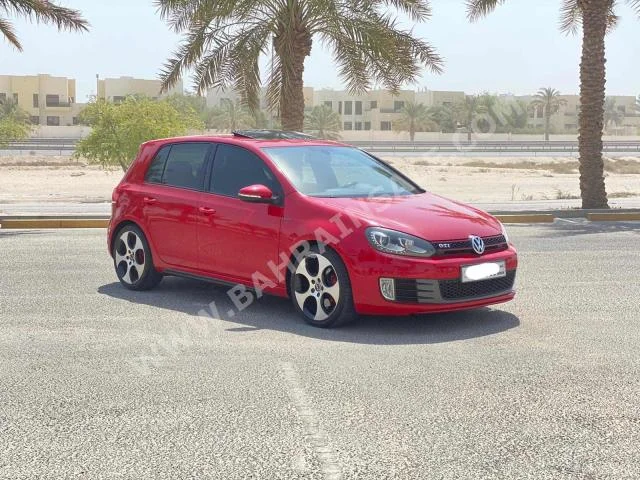 Volkswagen  Golf  GTI  2012  Hatchback  Automatic  4  124,200  FWD  Red  Gasoline