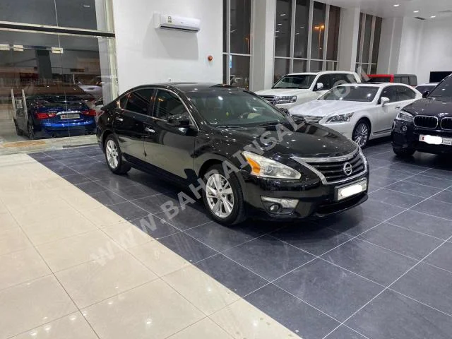 Nissan  Altima  2016  Sedan  Automatic  4  132,600  FWD  Black  Gasoline