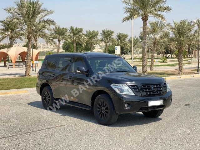 Nissan Patrol SE 2014 SUV Automatic 8 189,850 AWD Black Gasoline