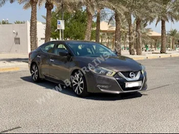 Nissan  Maxima  2016  Sedan  Automatic  6  166,400  FWD  Brown  Gasoline