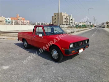 متسوبيشي  بيك أب  1986  بيكب  عادي  4  126,200  دفع أمامي  أحمر  بنزين