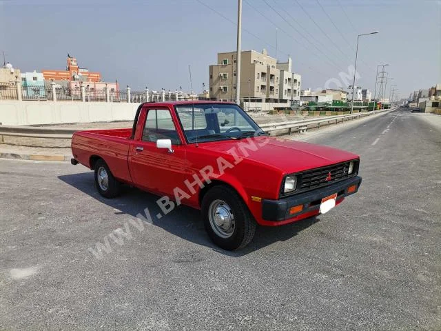 Mitsubishi  Pickup  1986  Pick Up  Manual  4  126,200  FWD  Red  Gasoline