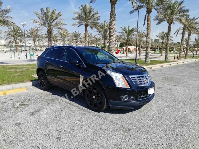 Cadillac  SRX  2013  SUV  Automatic  6  149,000  AWD  Black  Gasoline