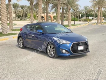 Hyundai  Veloster  2016  Hatchback  Automatic  4  97,800  FWD  Blue  Gasoline