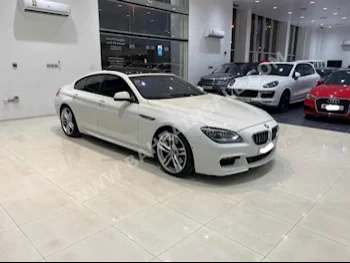 BMW  6-Series  640i  2015  Sedan  Automatic  6  67,200  AWD  White  Gasoline