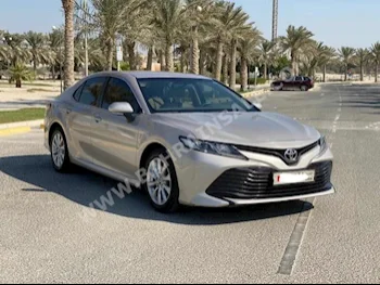Toyota  Camry  LE  2019  Sedan  Automatic  4  81,000  FWD  Beige  Gasoline