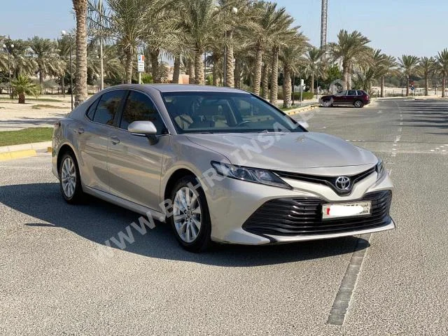 Toyota  Camry  LE  2019  Sedan  Automatic  4  81,000  FWD  Beige  Gasoline