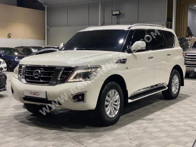 نيسان  باترول  2014  اس يو في  اتوماتك  8  237,000  دفع رباعي  أبيض  بنزين